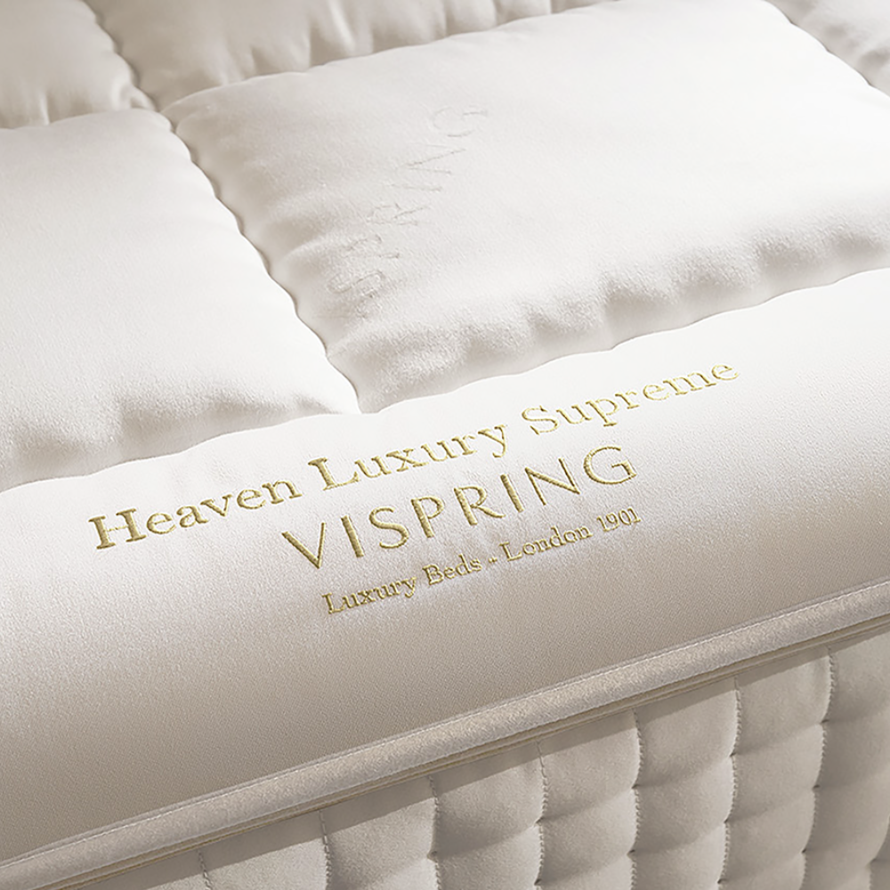 The Vispring Heaven Luxury Supreme Topper has hand-teased horsehair with 2 layers of wool above and two layers of wool below it and adds a plush but somewhat dense layer on top of the flatter sleeping surface of the mattress. 