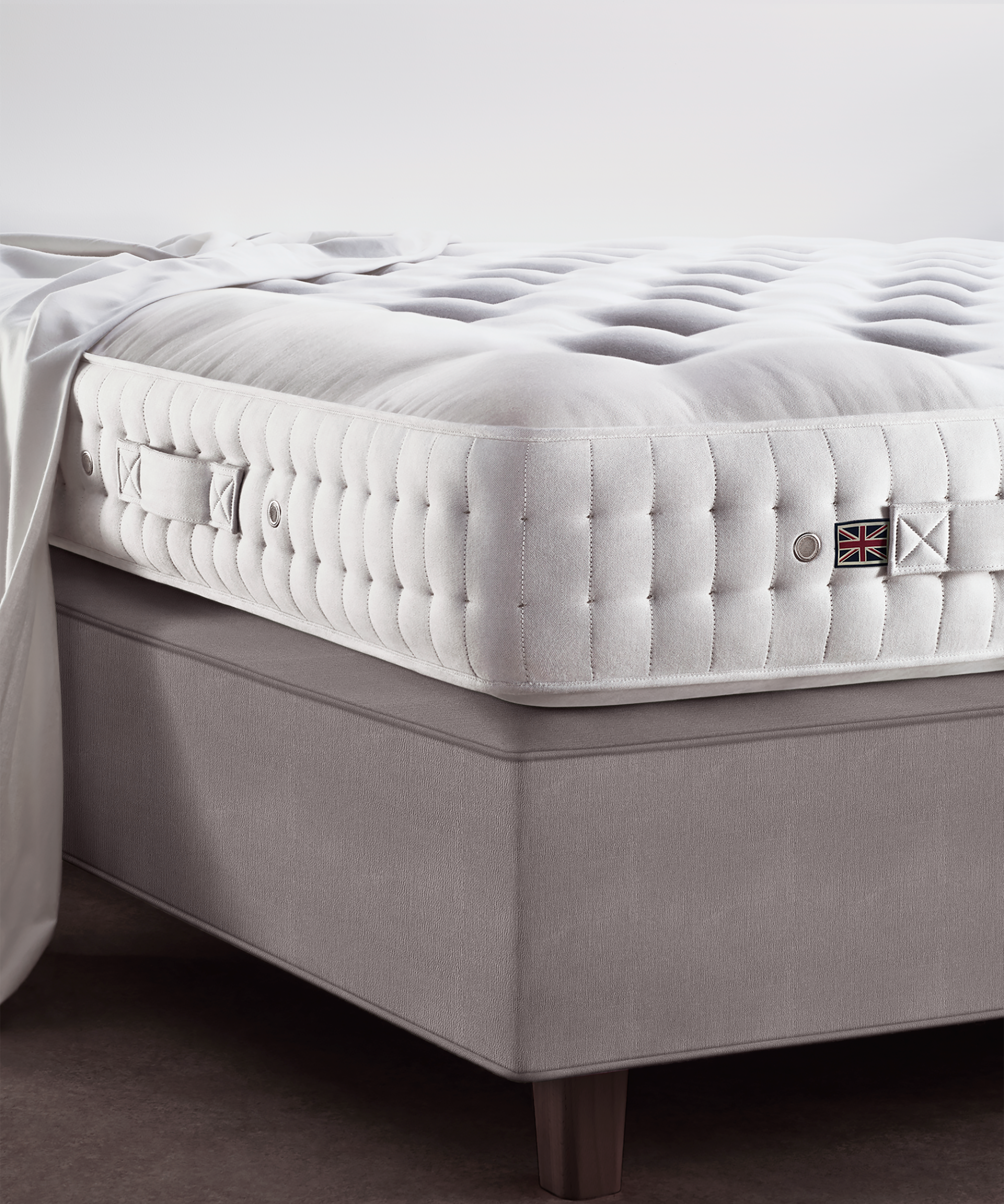 The Coronet's hand-teased British fleece wool and cotton in the topmost layer create a medium soft and resilient comfort layer that beautifully compliments the high coil count single-layer configuration of the exceptionally comfortable and wonderful mattress (2,058 coils / king).